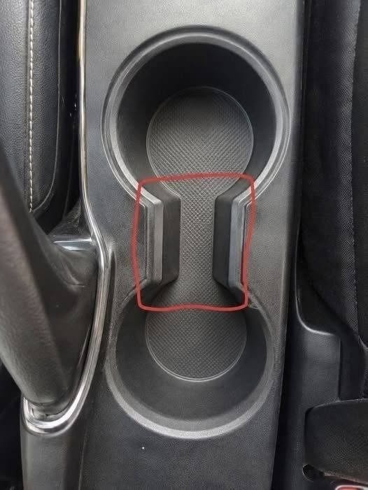 What Is the Weird Gap Between Car Cup Holders For???