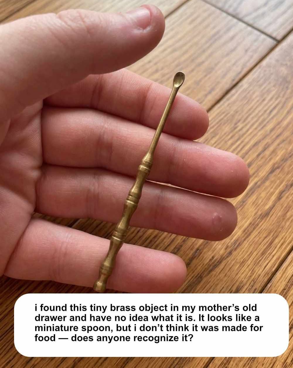 I found this tiny brass SPOON in my mother’s old drawer, but i have no idea what it is. does anyone know?